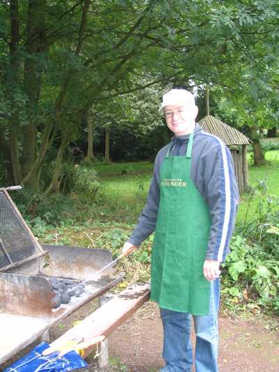 Gus starting the BBQ