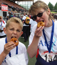 enjoying doughnuts after the Great Scottish Walk 2004