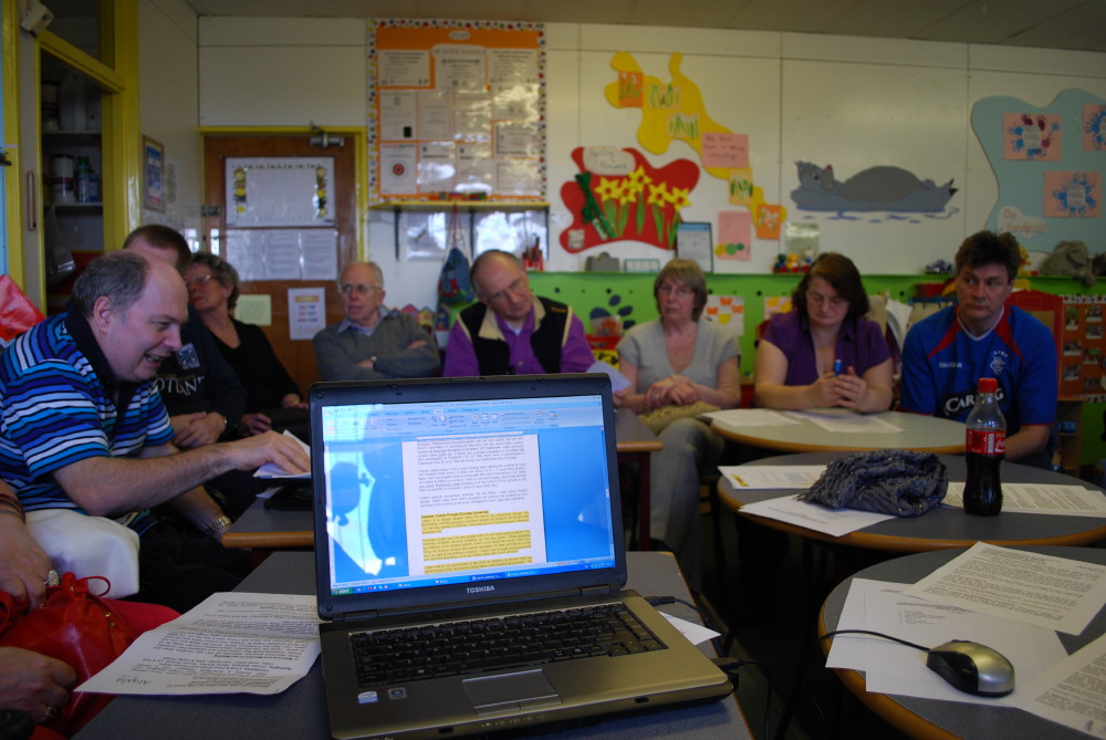 Derek chairing the meeting
